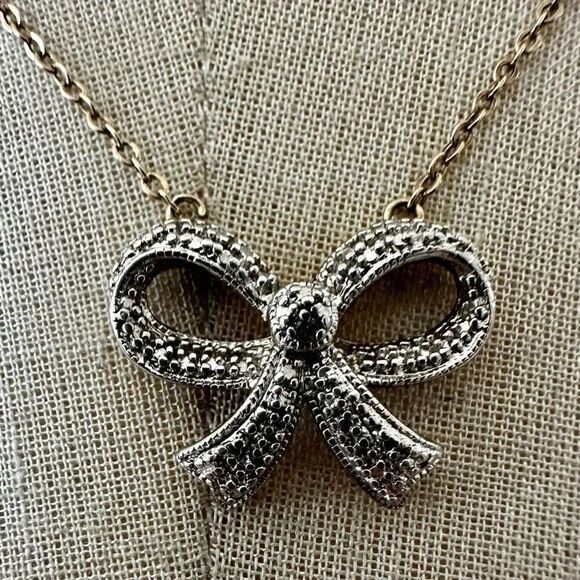 PAJ Bow Pendant Necklace Jewelry - PAJ Silver and gold Tone Textured Bow Pendant Necklace